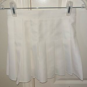White pleated skirt